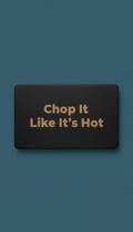 Black wooden chopping board with 'Chop It Like It’s Hot'