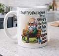 A white ceramic mug with a humorous quote about aging and a cartoon illustration of a grumpy old man sitting on a bench, placed on a kitchen countertop.